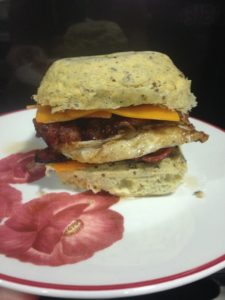 Keto sandwich with fried egg, bacon, and cheese