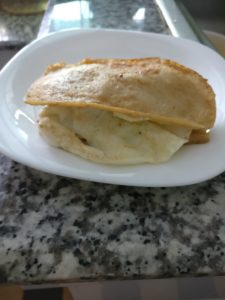 keto bread made from fried pieces of tofu with a fried egg