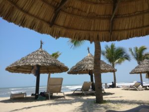 Blue sky and sun shade on Da Nang beach