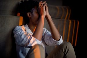 person practicing gratitude, hands folded 