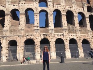 woman with narcolepsy in front of the Colosseum in Rome 