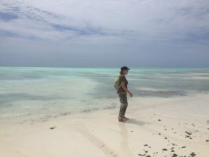 turquoise beach and a woman with narcolepsy admiring it all