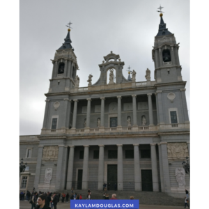 cathedral with two tall steeples and grey sky