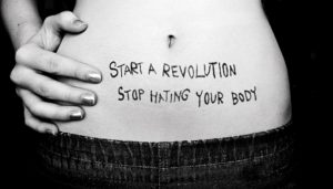 Stomach with the words Start a Revolution Stop Hating your Body