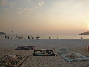 beautiful fabric on the beach at sunset 