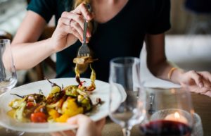 woman with food on a fork