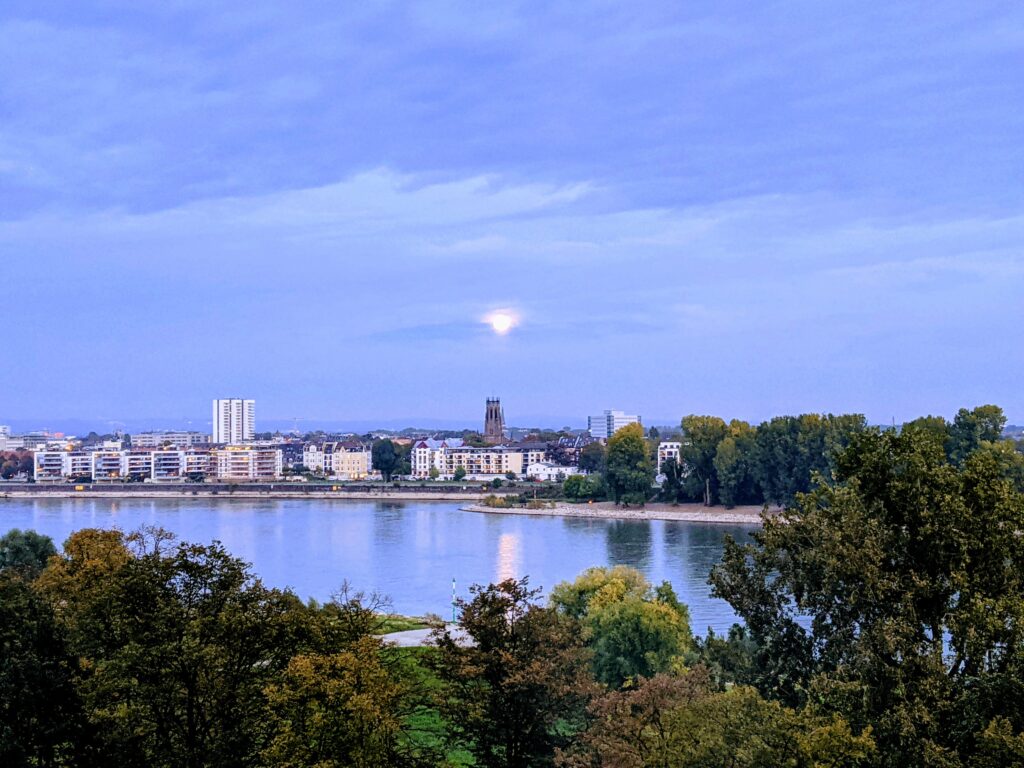 Full Moon in a soft blue sky before the end of daylight savings time 