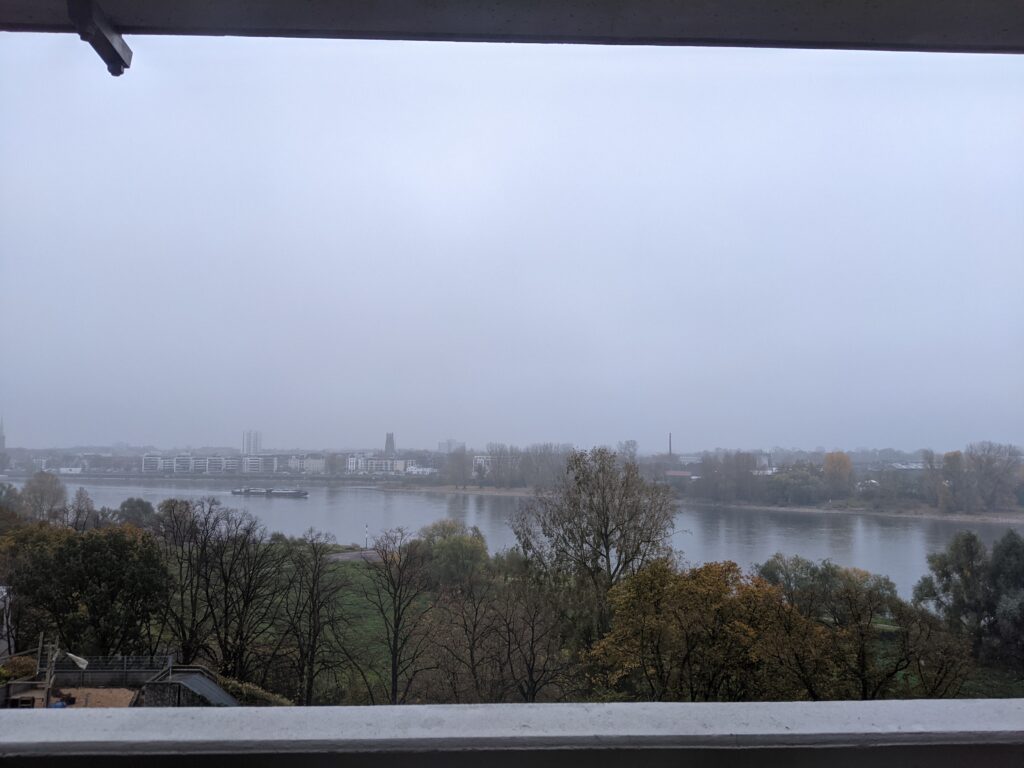 Completely grey view of the river on a morning after the end of daylight savings time