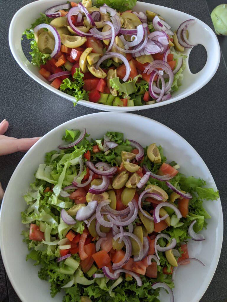 two healthy salads with onions, olives, lettuce, and tomato as narcolepsy treatment without medication